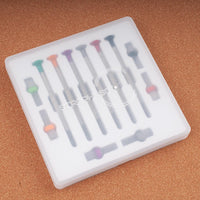 StrapHabit Mini Watch Screwdriver Pro Kit in clear-lidded carrying case showing the full set of precision screwdrivers and bits organized in a white tray